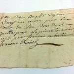 Reçu retrouvé entre les pages d'un livre pour le paiement d’une rente de banc d’église à Marc-Antoine Vignau, 1772.
